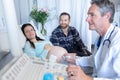 Doctor doing ultrasound scan for pregnant woman in hospital Royalty Free Stock Photo