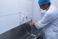 Male surgeon washing hands in sink at hospital Royalty Free Stock Photo