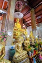 Side view of central shrine in the ordination hall, or ubosot, at Wat Yai Suwannaram, a Buddhist temple in Phetchaburi, Thailand