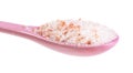 side view of ceramic spoon with pink Salt close up