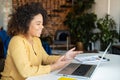 Young African-American woman using laptop at home Royalty Free Stock Photo