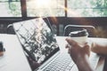 Side view of charming young hipster girl hands holding hot coffee cup Royalty Free Stock Photo