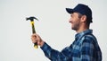 Side view of cheerful workman holding Royalty Free Stock Photo