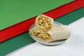 Side view Chicken shawarma roll on abstract background Royalty Free Stock Photo