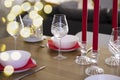 Side view of the Christmas setting of the festive table. Beautiful white kitchen appliances on the background of specks Royalty Free Stock Photo