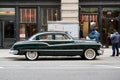 Side view of a classic vintage car in the street in NYC Royalty Free Stock Photo
