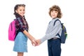 side view of classmates holding hands and looking at camera Royalty Free Stock Photo