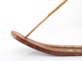 Close-up of natural incense stick on wooden censer on white background Royalty Free Stock Photo