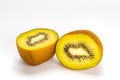 Side view closeup of two halves fresh ripe sweet kiwi fruit on white background Royalty Free Stock Photo