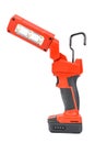 Side view of cordless 12V LED task light with flexible head and retractable hook for hands-free lighting in red and black Royalty Free Stock Photo