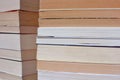Side view of corner of multiple old stacked books Royalty Free Stock Photo