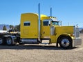 A Big Yellow Sleeper Cab Semi Truck and Flat Bed! Transportation and Logistics! Royalty Free Stock Photo