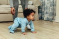 Side view of cute baby boy crawling Royalty Free Stock Photo