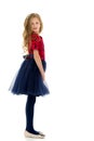 Side View of Cute Pretty Girl Wearing Nice Dress with Blue Tulle Royalty Free Stock Photo