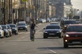 Side view of cyclist driving the road