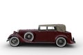 Side view 3D illustration of a large old red vintage car with soft top roof isolated on a white background Royalty Free Stock Photo