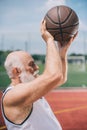 side view of elderly bearded man