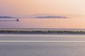 Side view of empty asphalt road and lake Royalty Free Stock Photo