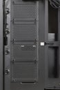Side view of empty big tower, PC case, chassis, without right metal panel . Place for four SATA SSDs. Storage capacity for Royalty Free Stock Photo
