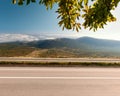 Side view of empty highway in mountain area Royalty Free Stock Photo