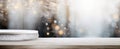 Side view of an empty white wooden table top with a white podium. Gentle blurred soft winter lights through the window. Royalty Free Stock Photo