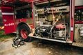 The side view of equipment packed neatly inside a fire engine, fire truck. boston, usa - oct, 2022