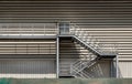 Side view of an external metal staircase as an Fire escape route at modern warehouse building Royalty Free Stock Photo