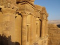 Side view of the facade of the Monastery on the mountain of Petra, Jordan Royalty Free Stock Photo