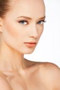 Side-view face of a beautiful girl with healthy spotless skin naked shoulders Royalty Free Stock Photo