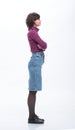 Side view. fashionable young woman in denim skirt.