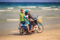 Side View Father Children Ride Old Motorbike on Beach