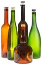 Side view of few empty closed wine bottles