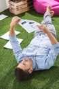 Side view of focused businessman analyzing documents