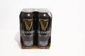 Side view of a four Pack of Guinness 440 ml beer cans Royalty Free Stock Photo