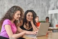 Side view of freelancers working online in cafe Royalty Free Stock Photo