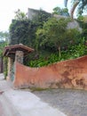 Side view of the front gate of a beach house in Ilhabela city, SP, Brazil.