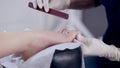 Side view of a gash toenails in salon