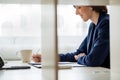 Side view of a smiling young business woman Royalty Free Stock Photo