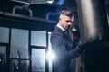 side view of handsome businessman in suit boxing
