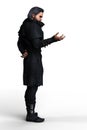 Side view of a man holding his hand out in an urban fantasy style mage pose