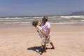 Senior couple dancing together on beach Royalty Free Stock Photo