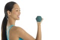Side View Of Happy Woman Lifting Dumbbells