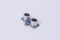 Side view of HC-SR04 ultrasonic sensor module on white background Royalty Free Stock Photo