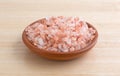 Side view of Himalayan pink salt in a small bowl