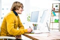 Side view of hipster businessman using tablet graphic Royalty Free Stock Photo