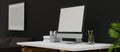 Side view, home working space in modern living room, PC on working table, frame mockup Royalty Free Stock Photo