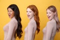 Side view image of young winking three ladies Royalty Free Stock Photo