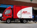 Side View Of A J&T Express Delivery Van