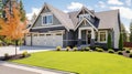 The side view of a large gray craftsman new construction house with a landscaped yard. Generative AI Royalty Free Stock Photo