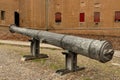 Large Renaissance cannon in the interior courtyard of the Castello Estense in Ferrara Royalty Free Stock Photo